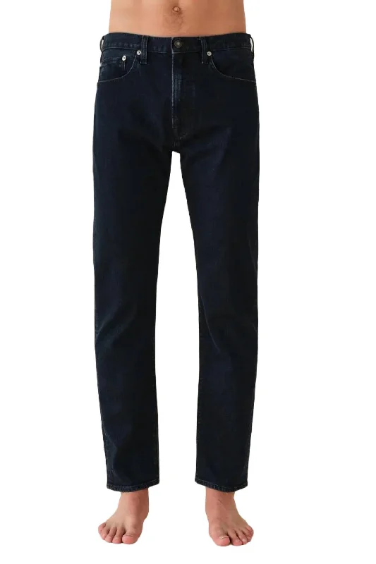 Tapered Mid Rise Jean In Blue Black